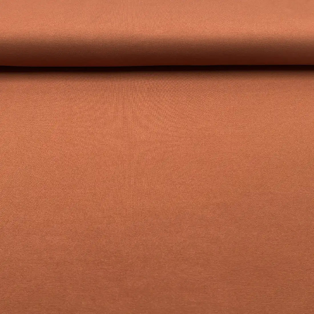 Tissu Jersey de Punto terracotta – Élégance et confort inégalés