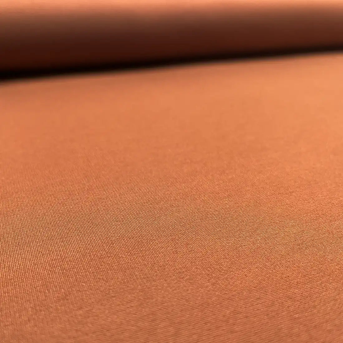 Tissu Punto terracotta – Tombé lourd et texture douce
