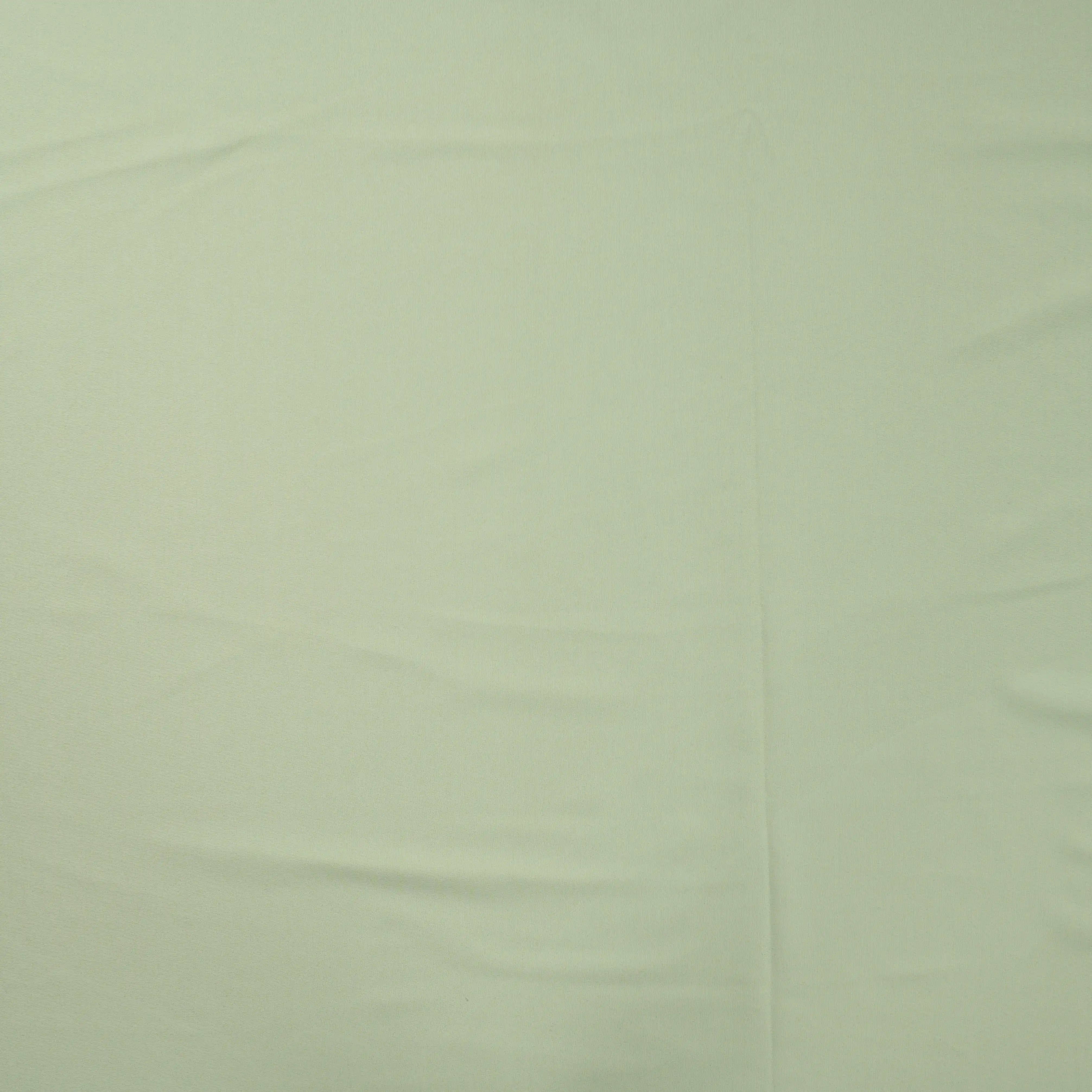 Tissu Sport Vert Amande – Confort et Élasticité