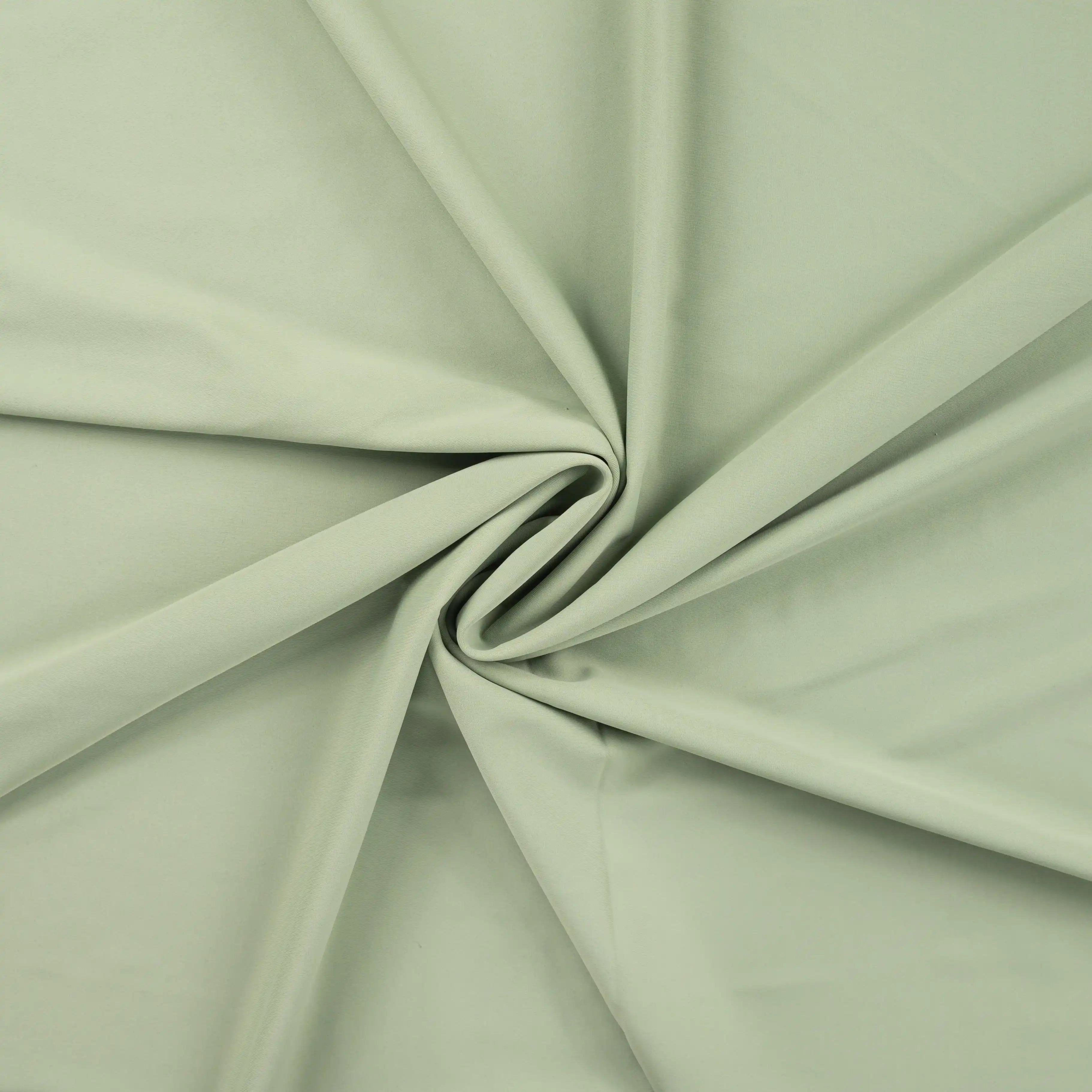 Tissu Vert Amande Extensible – Souple et Respirant