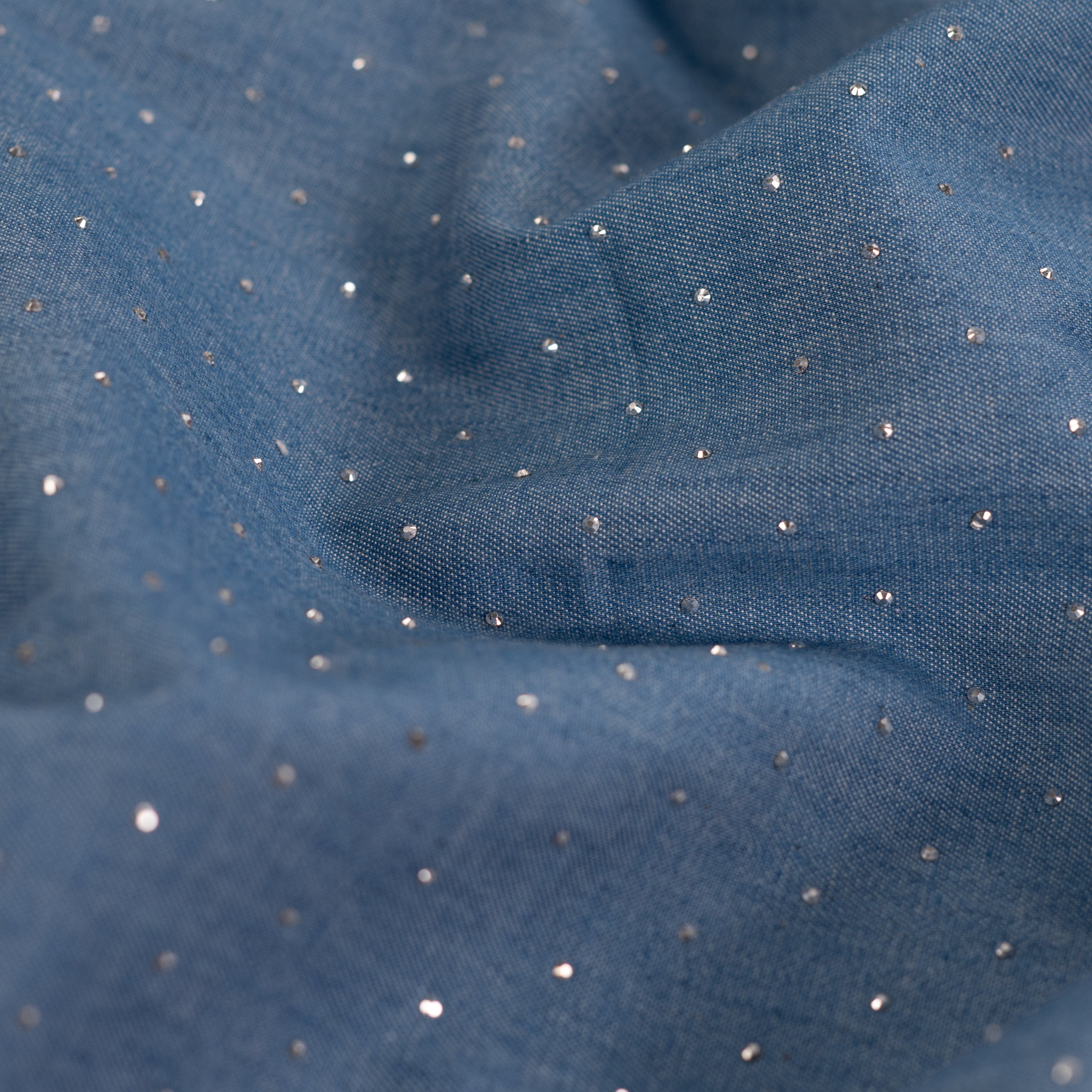 Tissu jean fin bleu avec strass