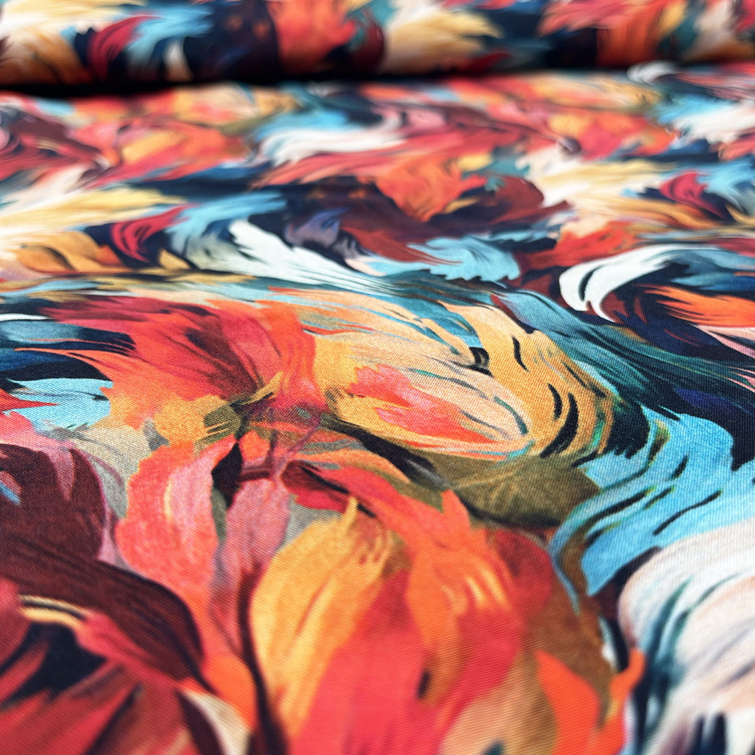 Viscose Plumes Aquarelle en Dégradé Rouge, Orange et Bleu