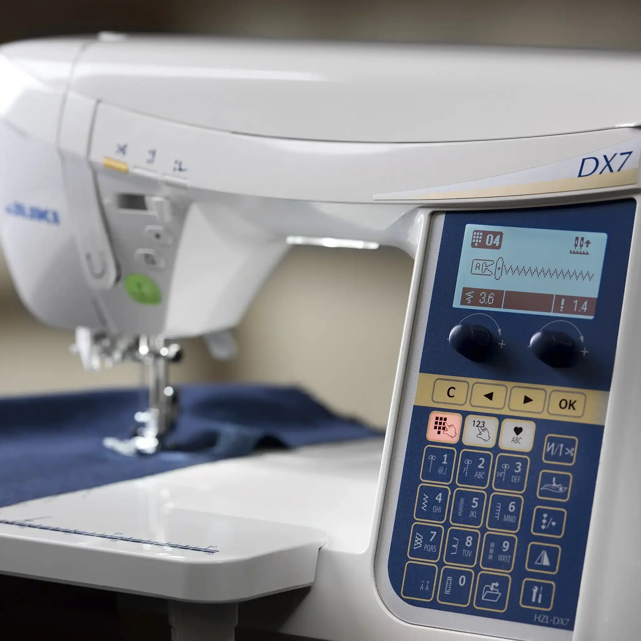 Machine à coudre JUKI HZL - DX7