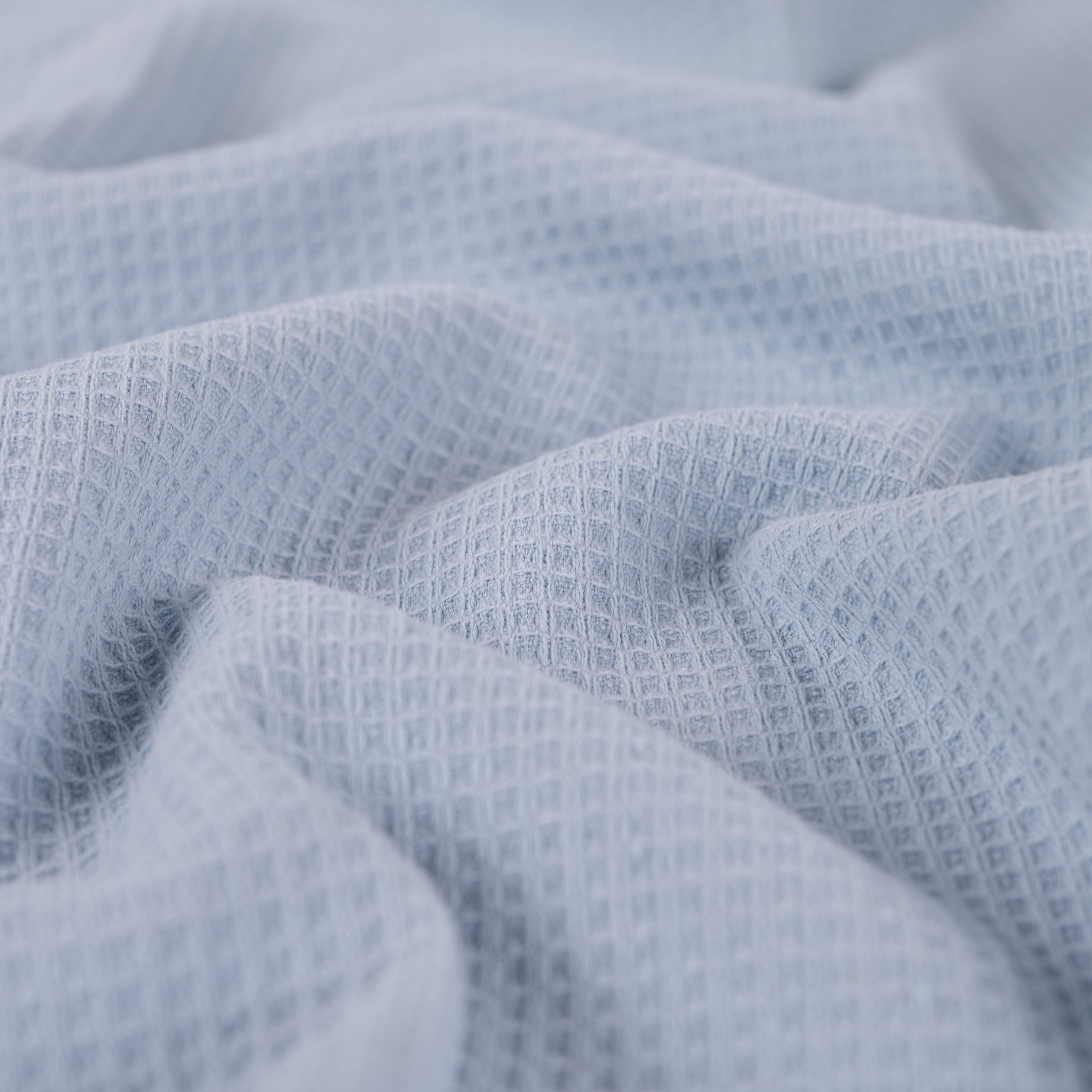 Tissu nid d’abeille doublé d’éponge bleu clair