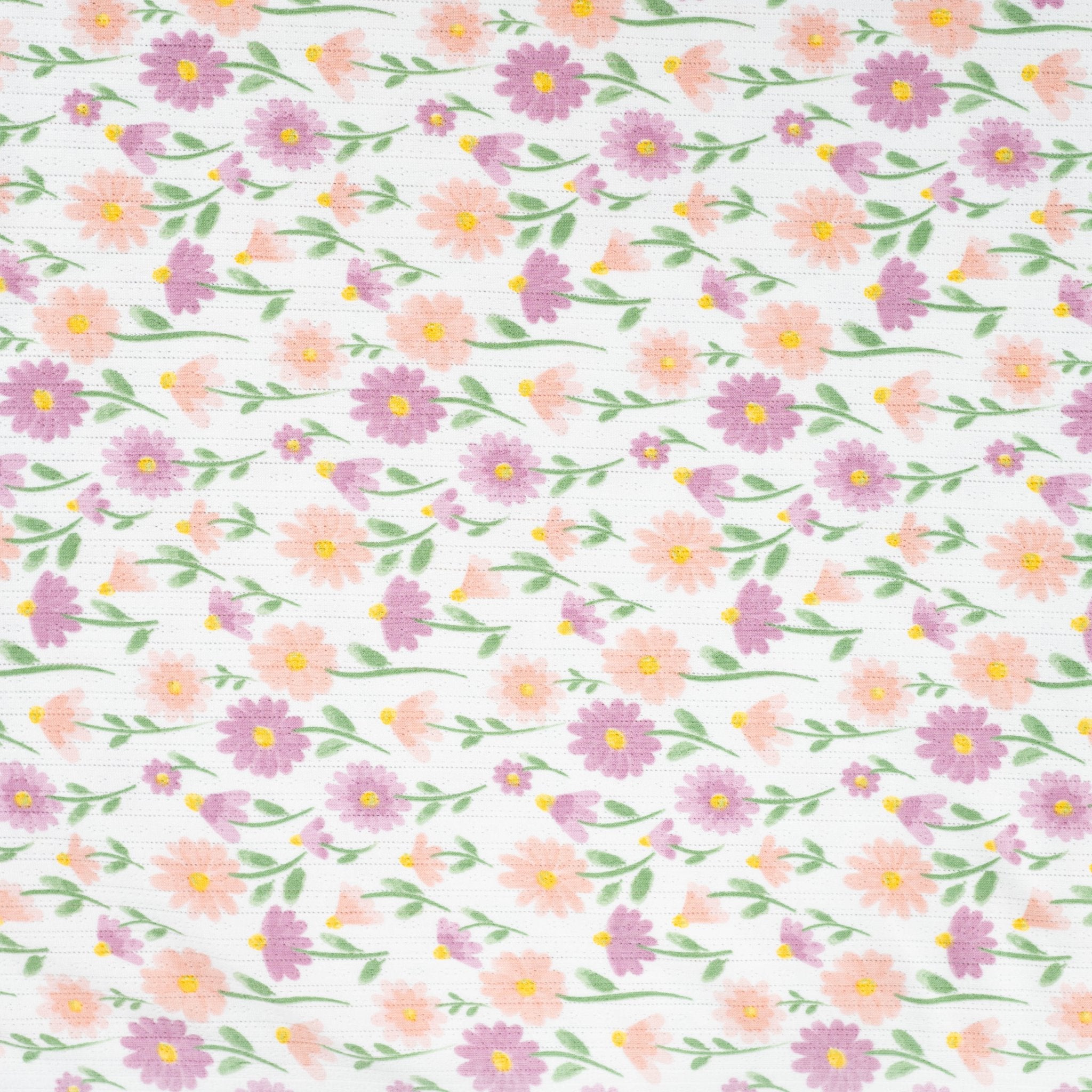 Tissu Jersey Ajouré Pâquerettes pastel