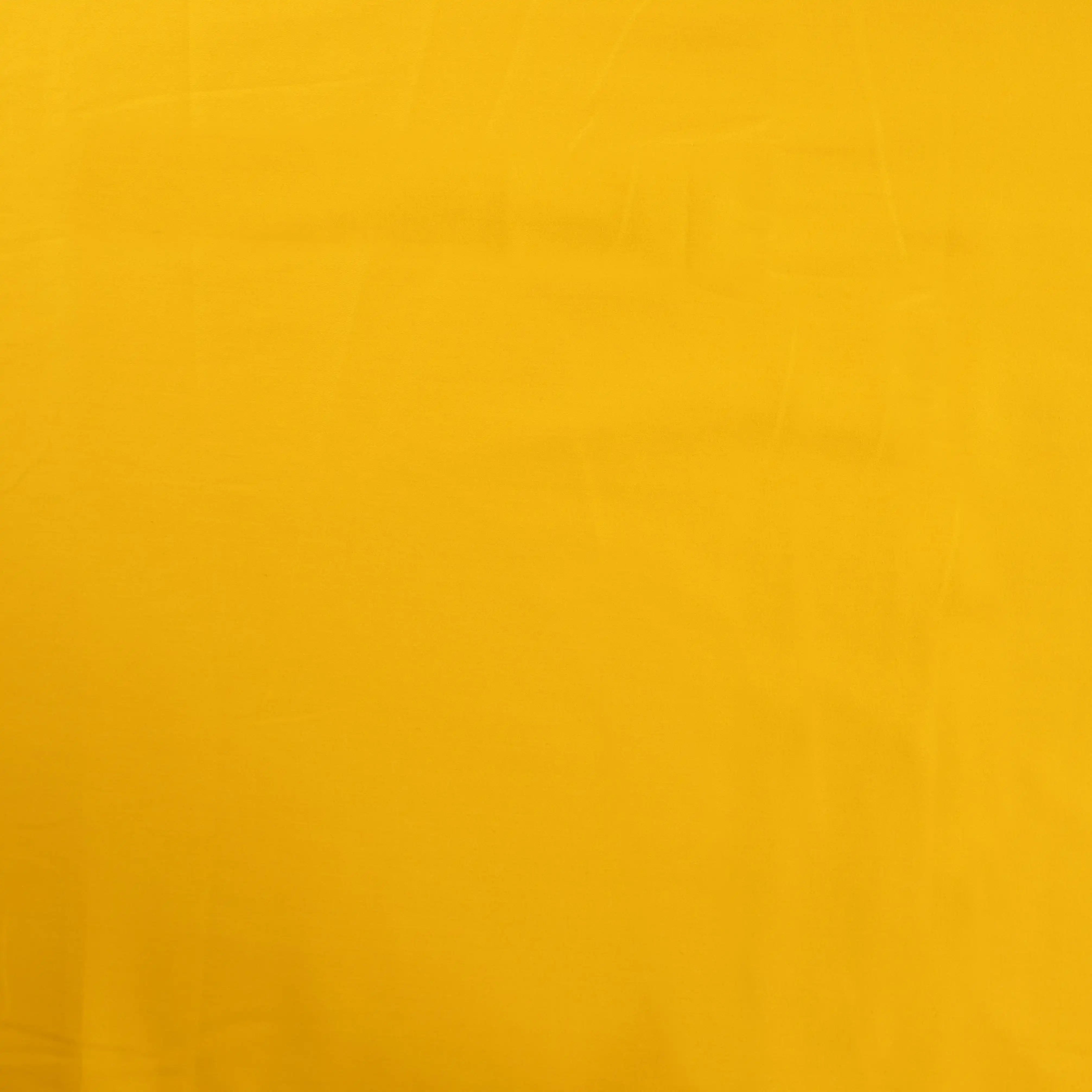 Tissu satin de coton jaune moutarde