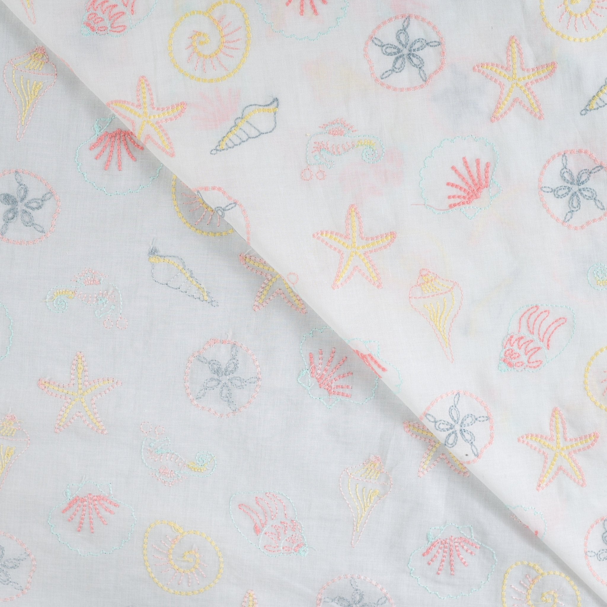 Tissu broderie anglaise coquillage