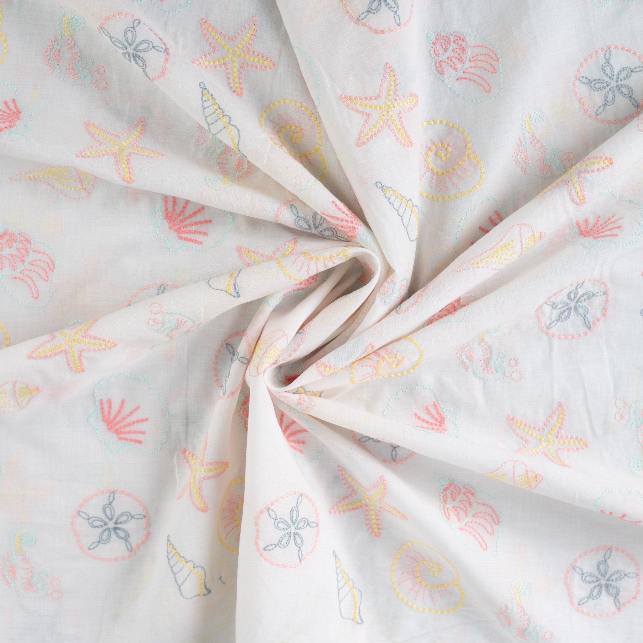 Tissu broderie anglaise coquillage