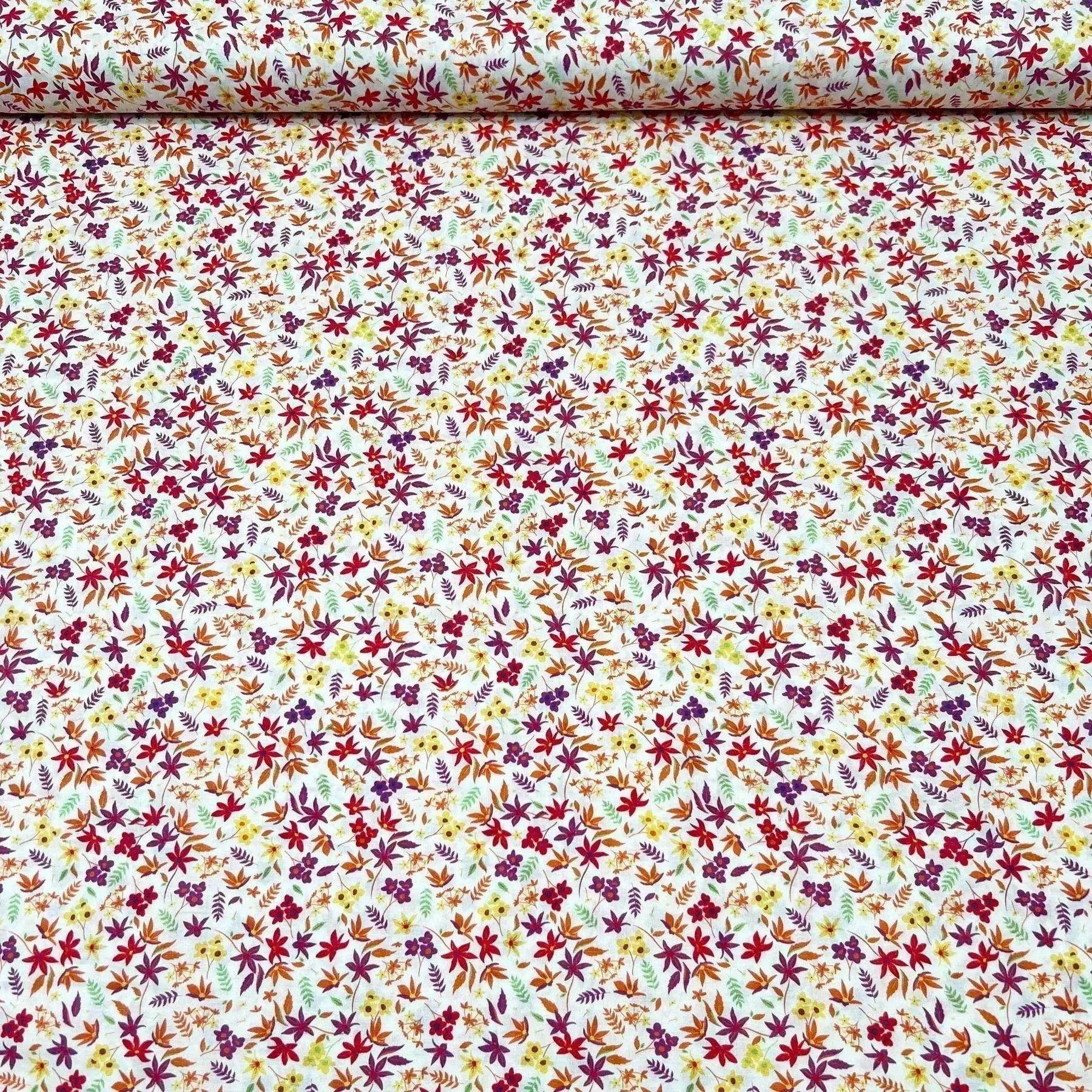 Tissu coton suisse style liberty fleurs hémérocalle orange et ocre