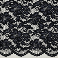 Tissu dentelle bleu marine fleurie à bord festonné