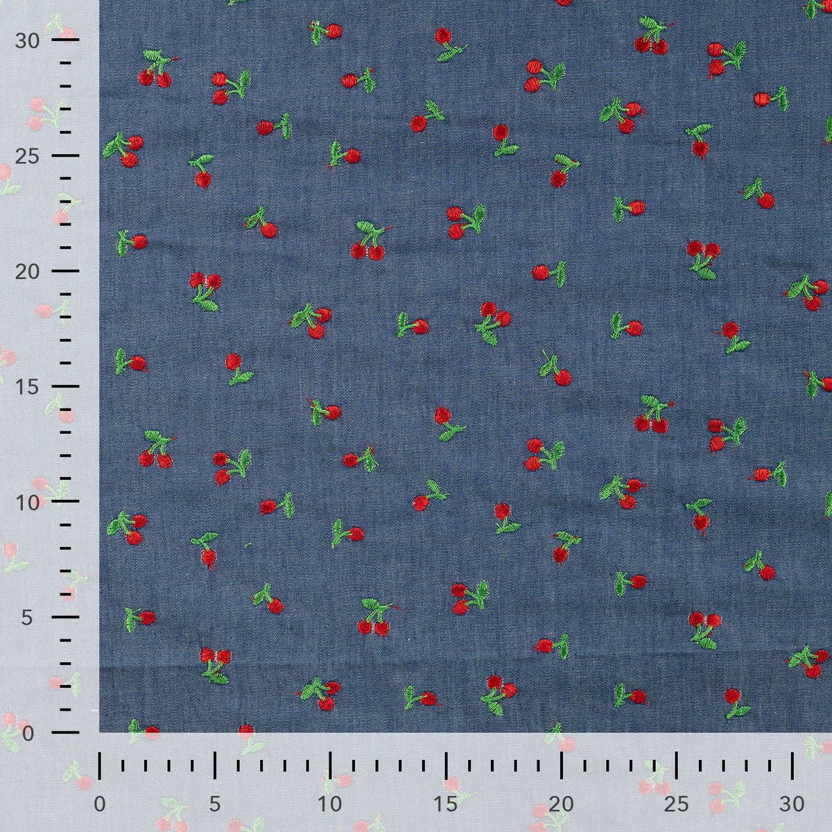 Tissu jean fin à broderie cerise