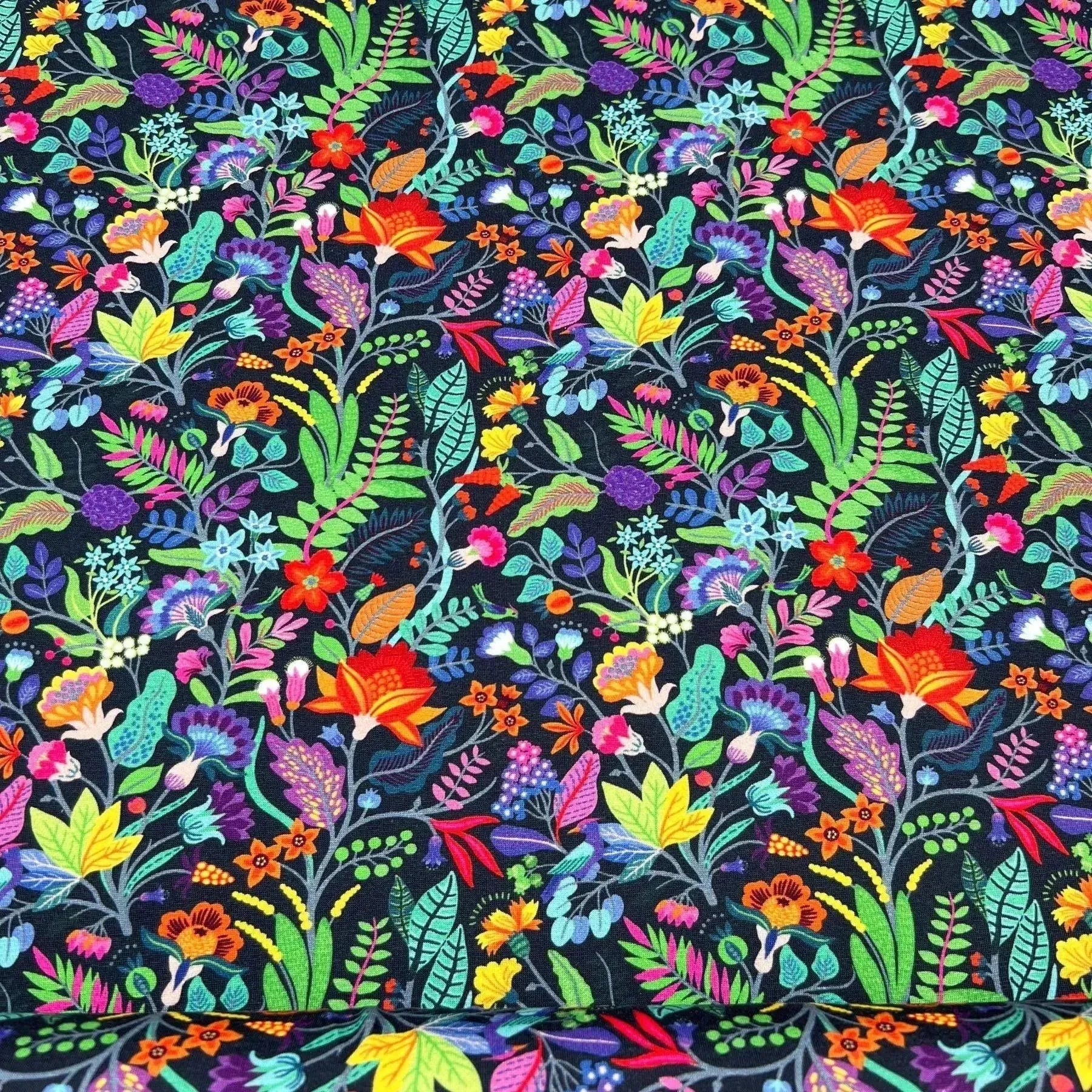 Tissu jersey de coton fleurs sauvages fond bleu