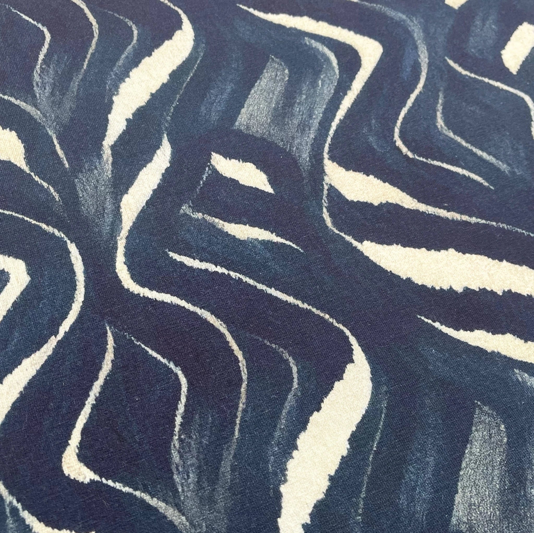 Tissu Jersey French Terry bleu nuit abstrait