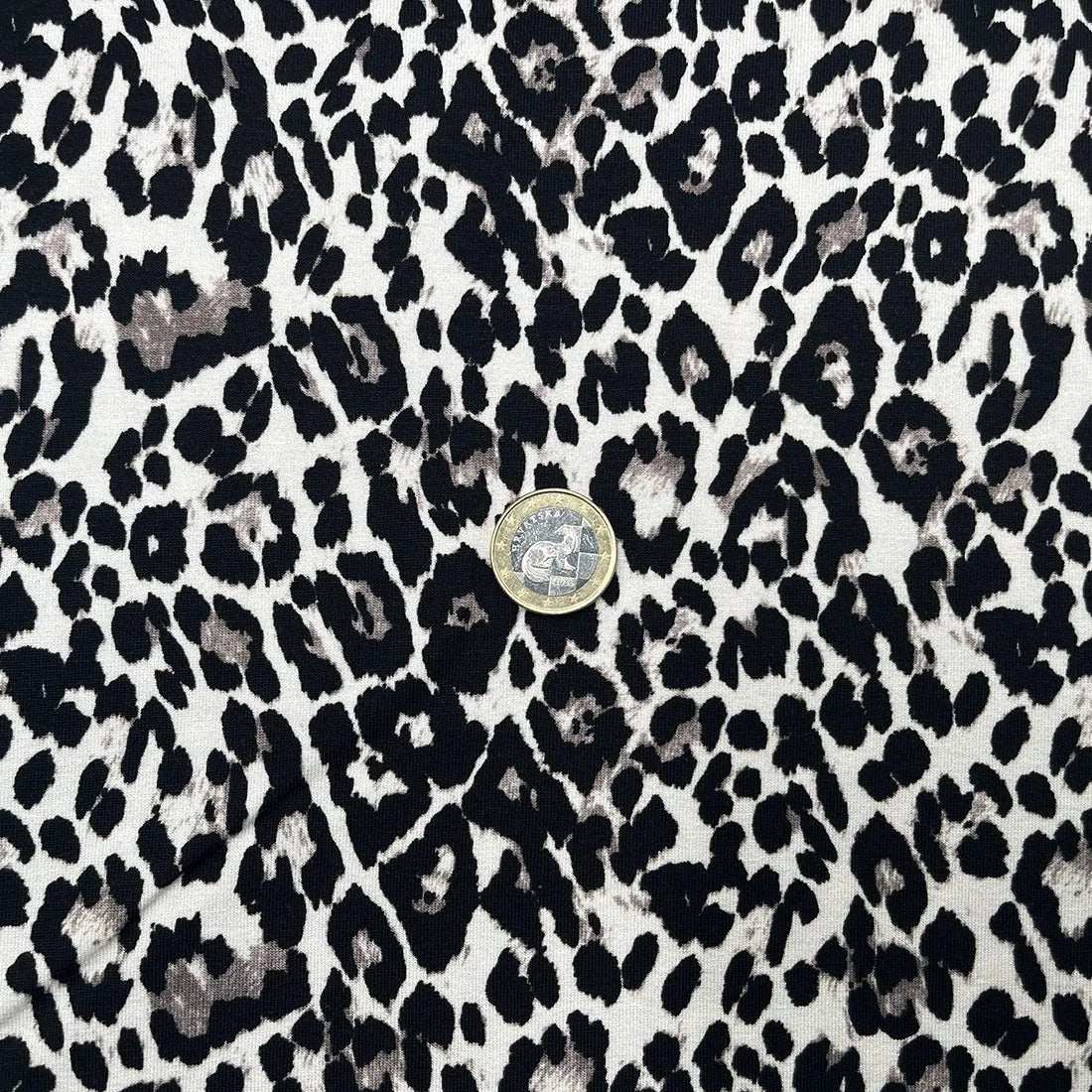 Tissu jersey imprimé léopard noir et beige