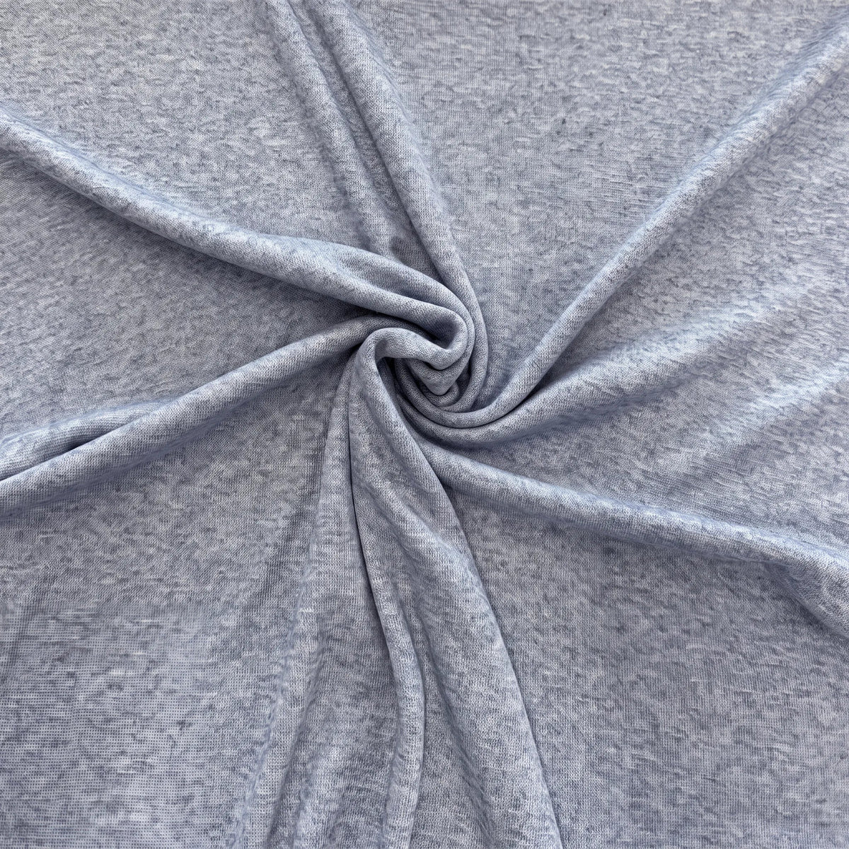 Maille tricot bleu jean chiné drapée