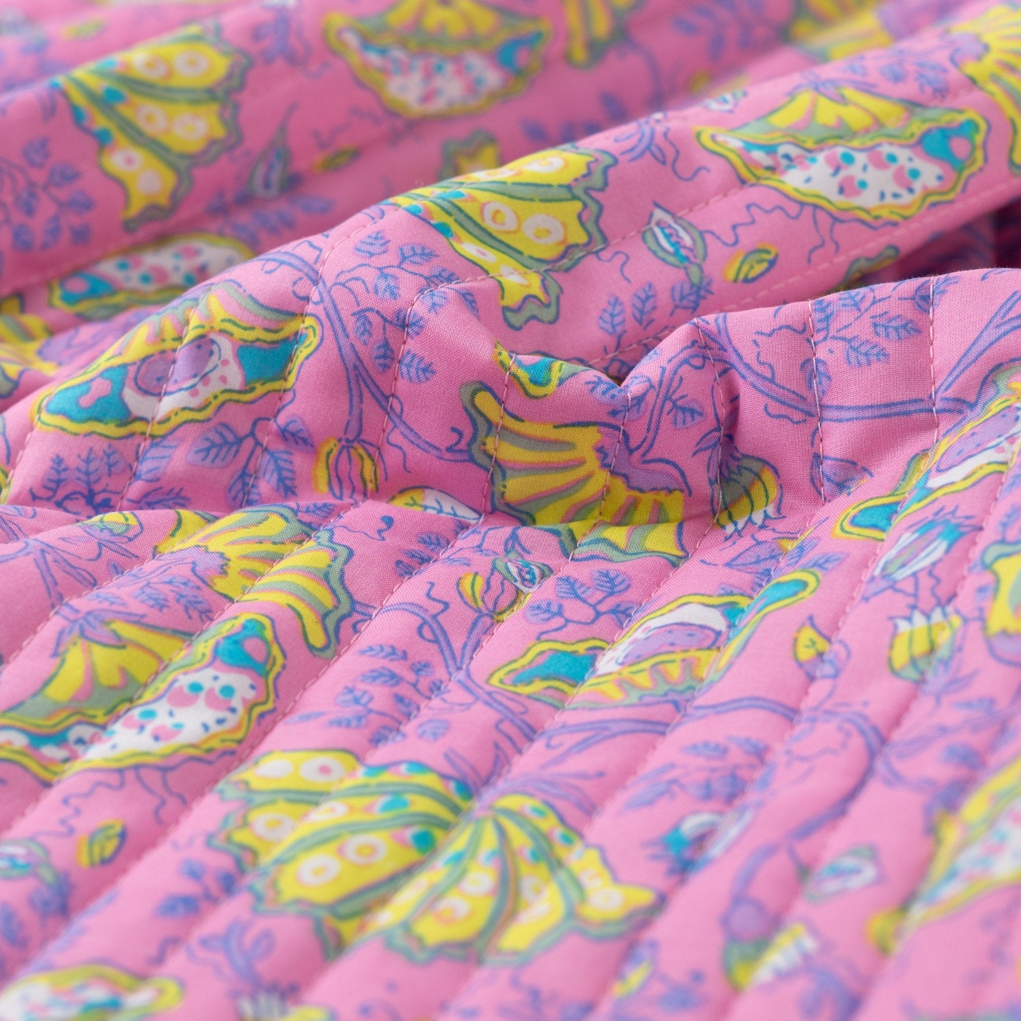 Tissu matelassé arabesque couture