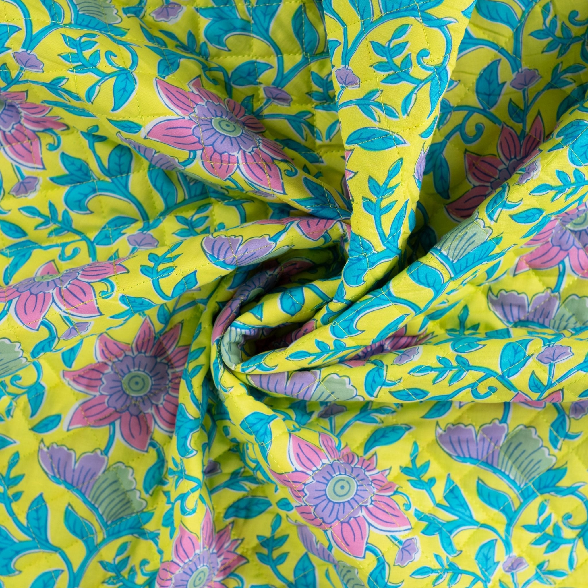 Tissu matelassé fleur royale