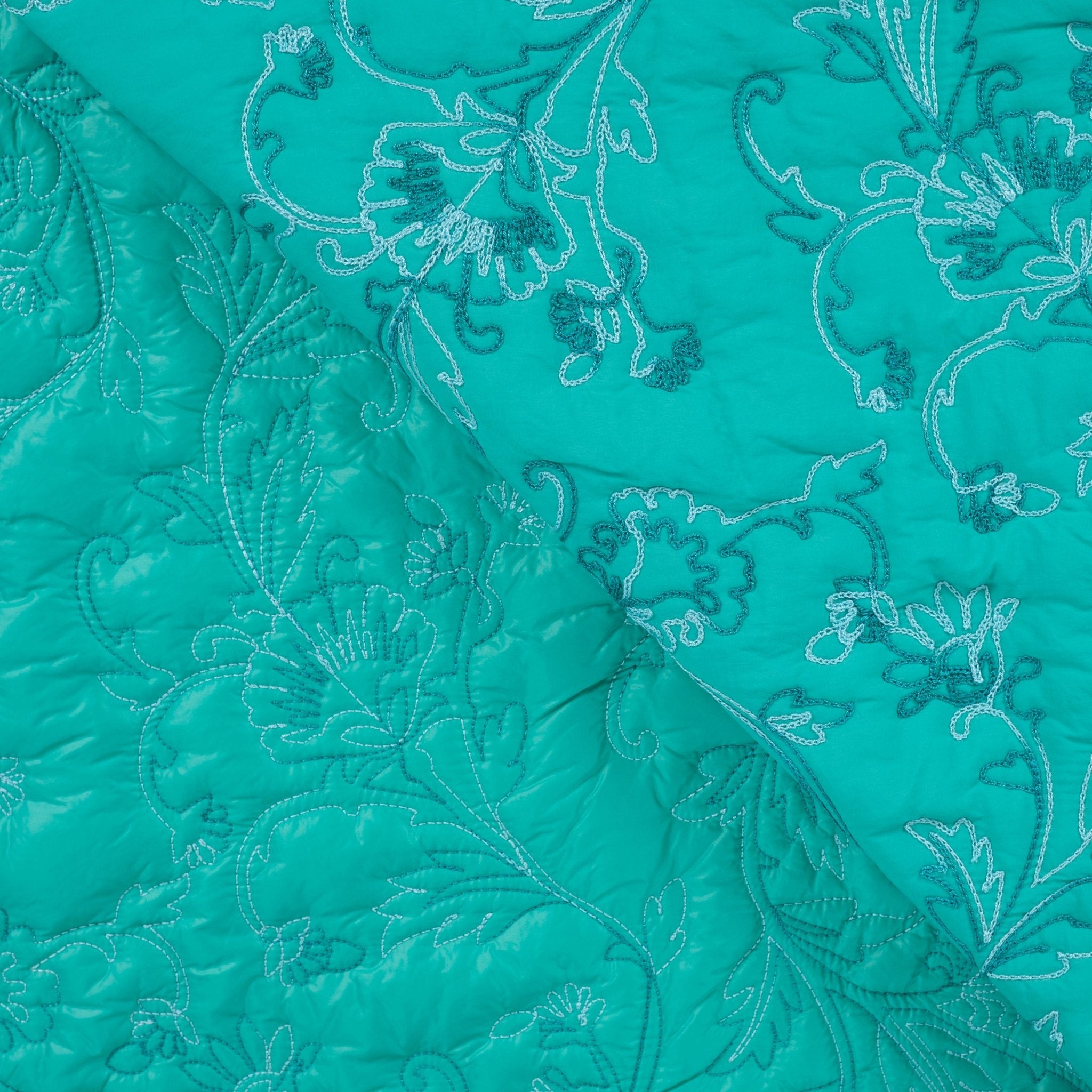 Tissu matelassé turquoise