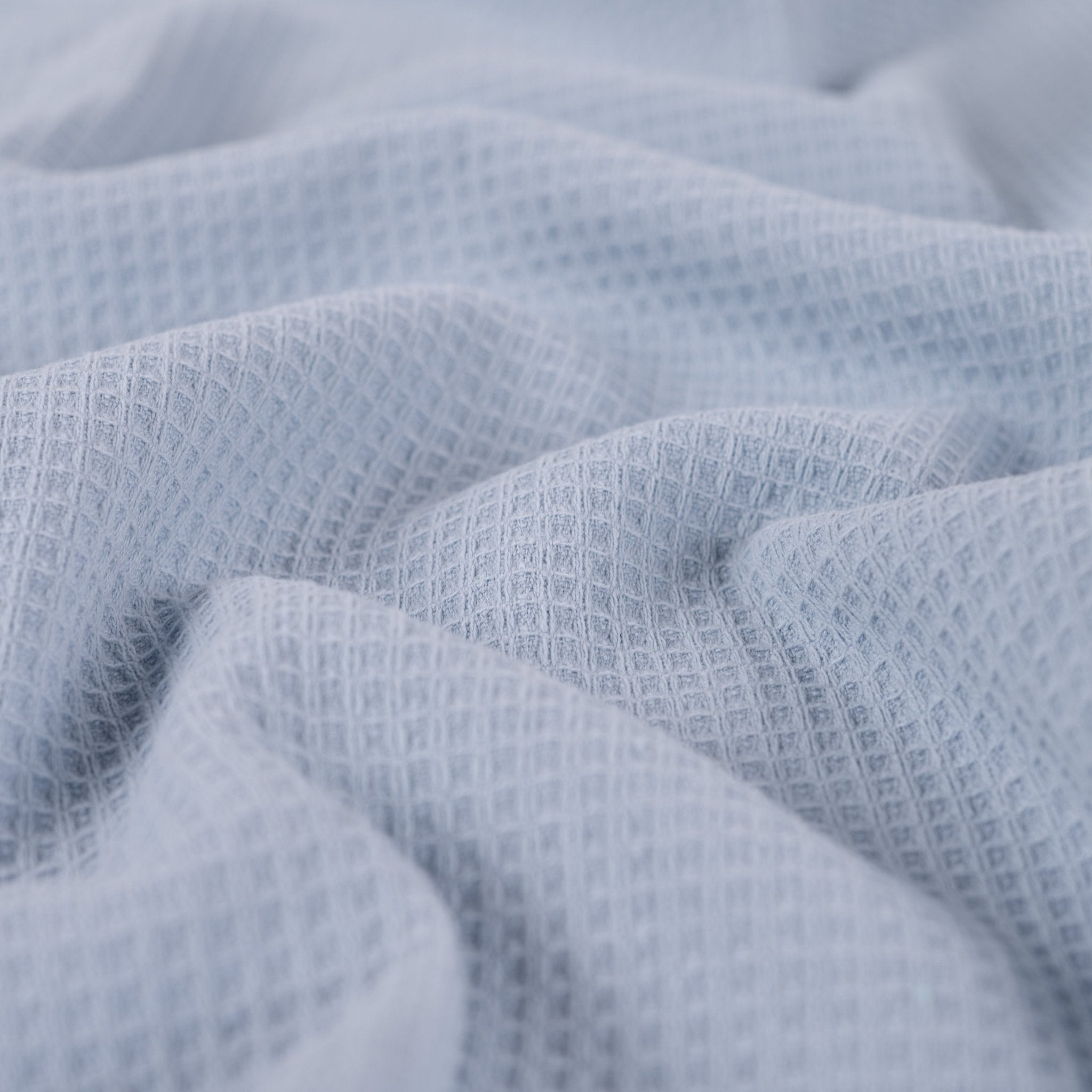 Tissu nid d’abeille doublé d’éponge bleu clair