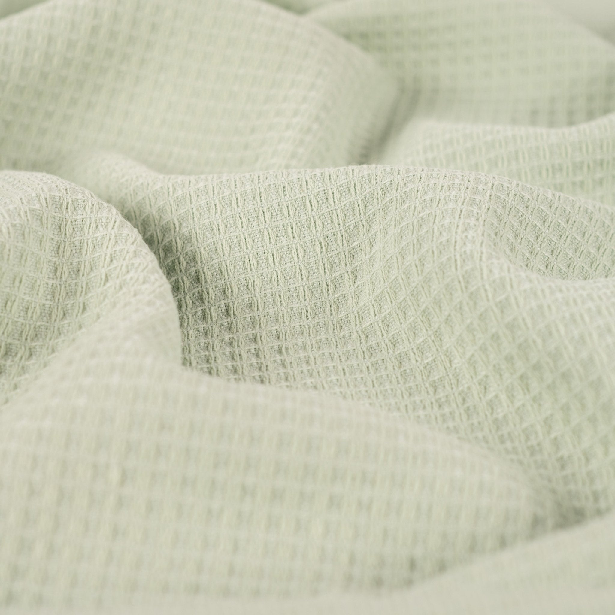 Tissu nid d’abeille doublé d’éponge vert menthe