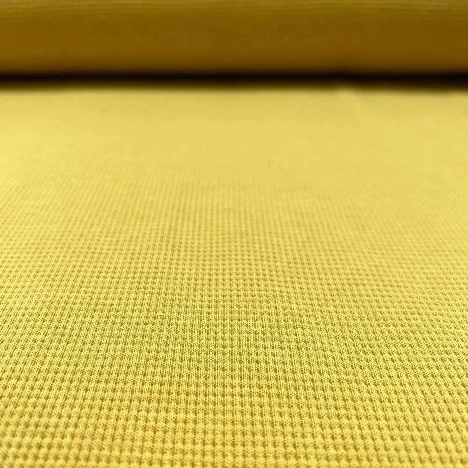 Tissu piqué de coton doux ocre