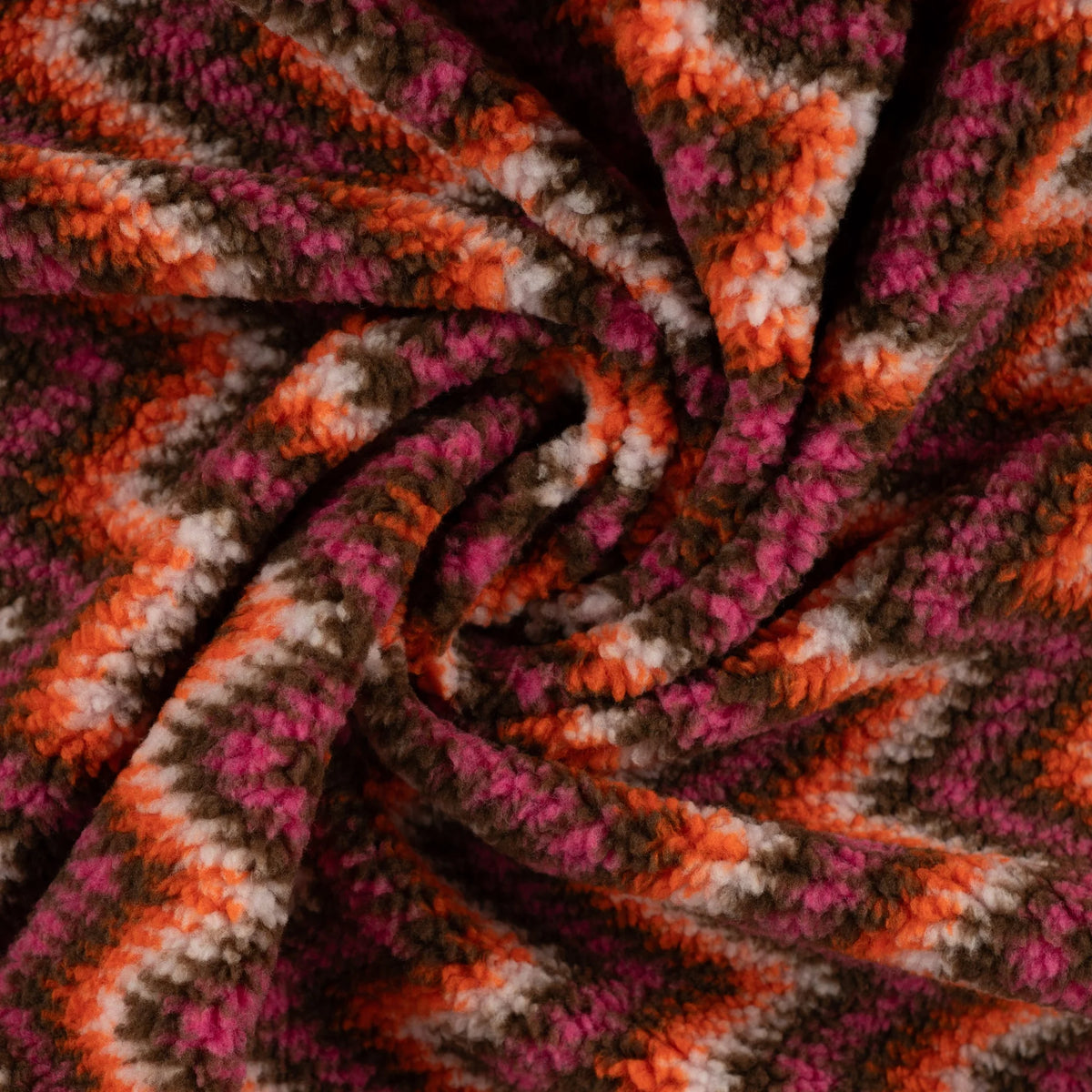 Tissu teddy jacquard zigzag fuchsia drapé, effet moelleux