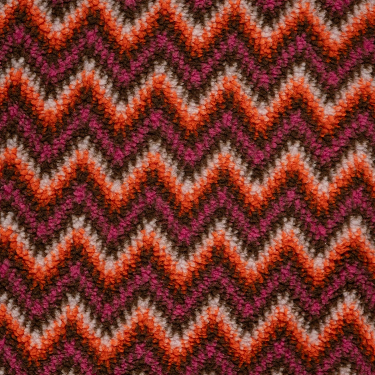 Endroit bouclé et envers jacquard du tissu teddy zigzag fuchsia