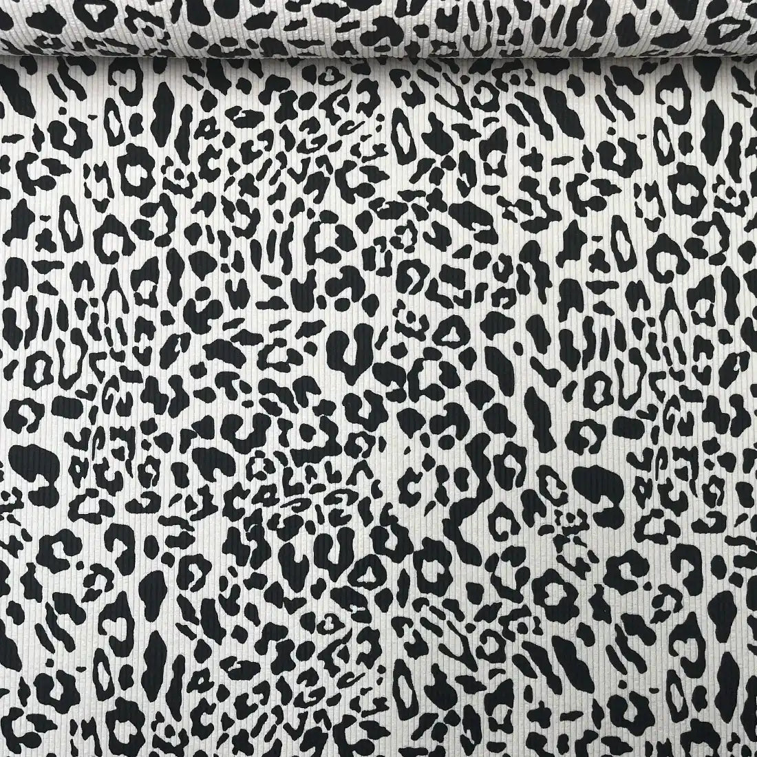 Tissu velours léopard noir et écru