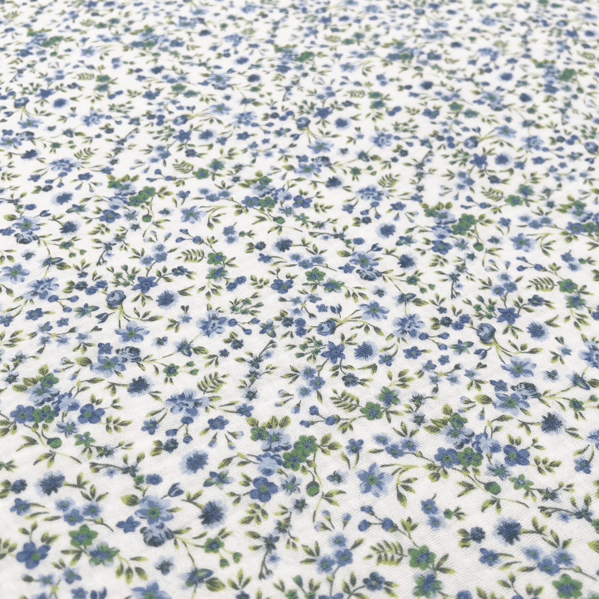 Tissus double gaze fleurs bleues