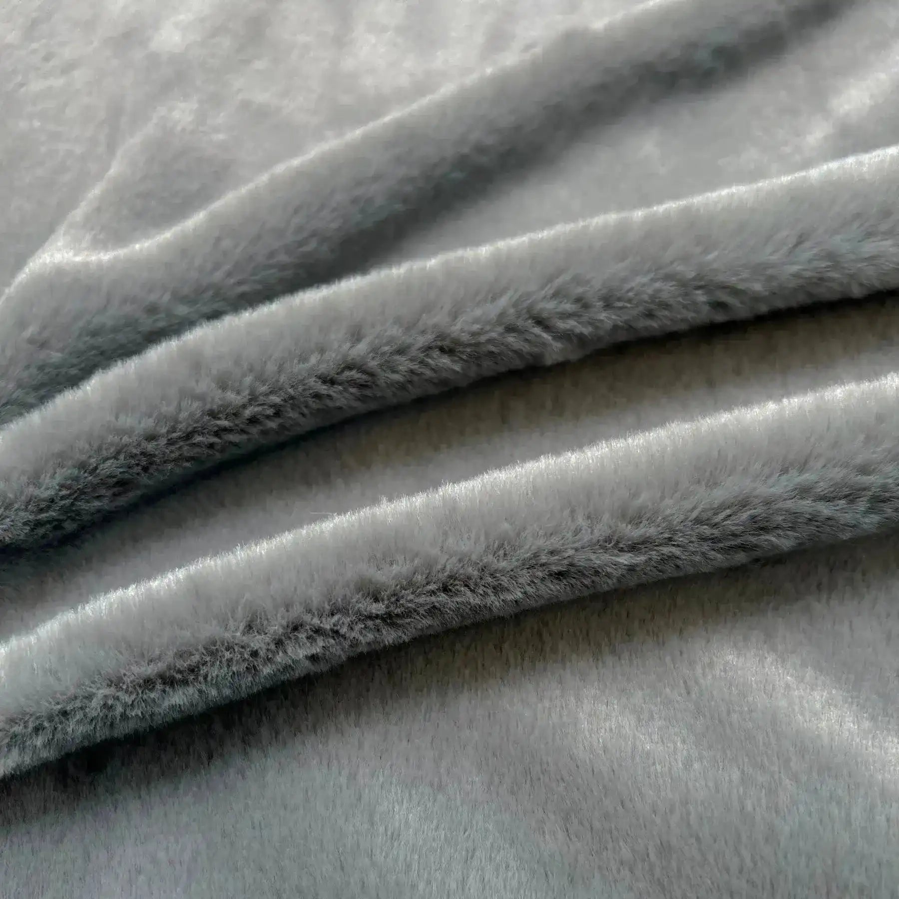 Tissus fausse fourrure gris