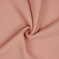 Tissus nid d'abeille rose