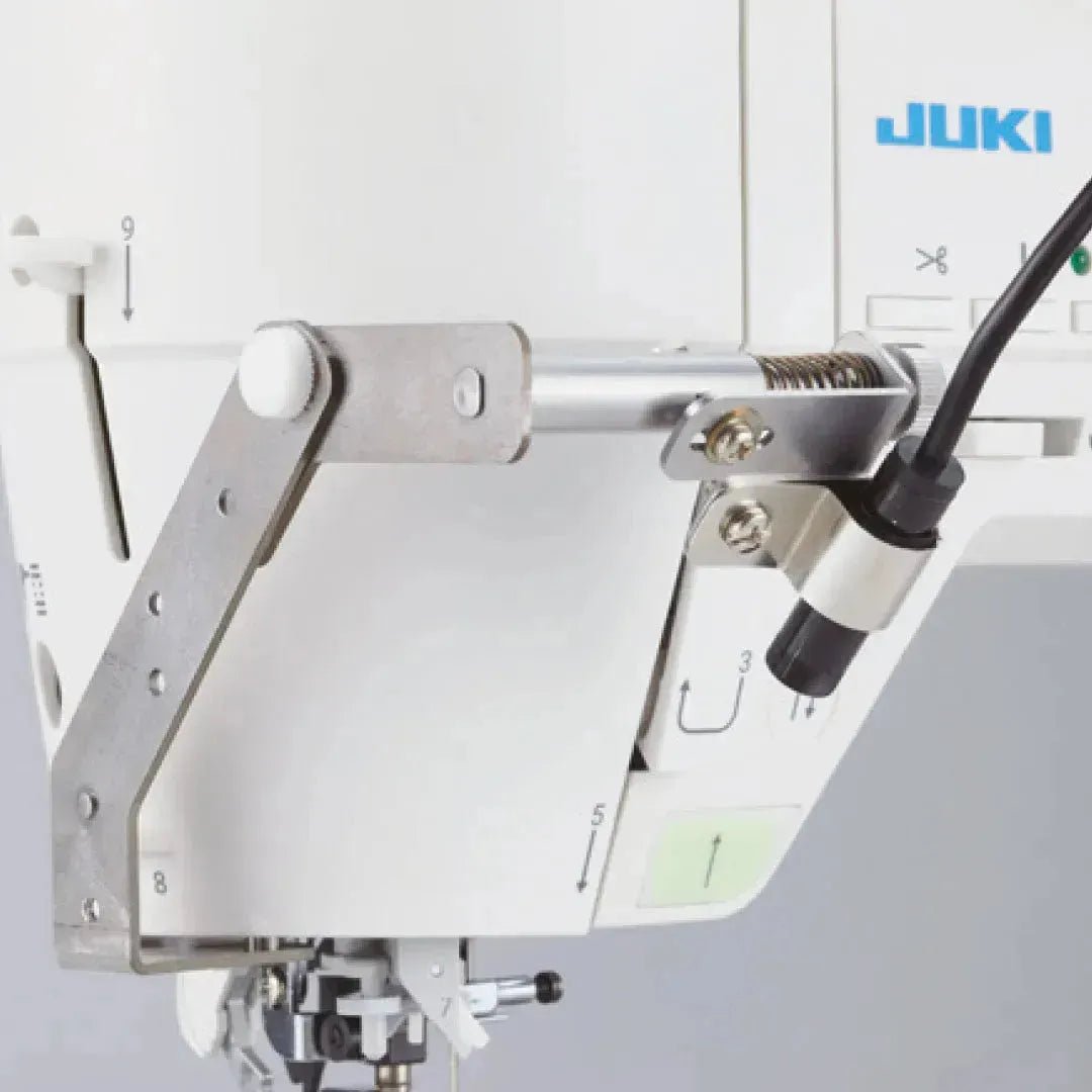 Guide d'utilisation du pointeur laser sur la machine à coudre JUKI UX8 - Verotex