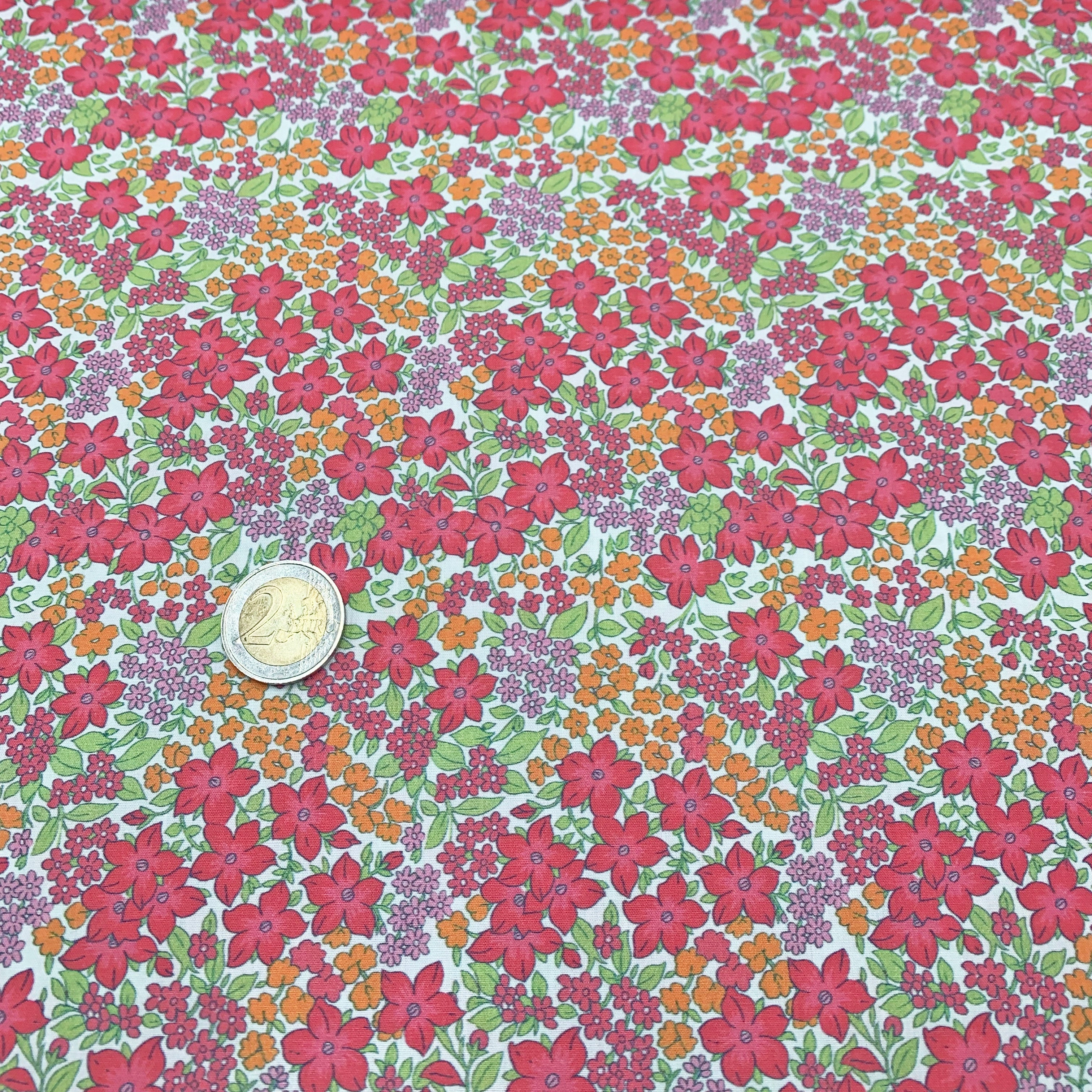 tissu-popeline-fleur-clematite-rose-taille-motif