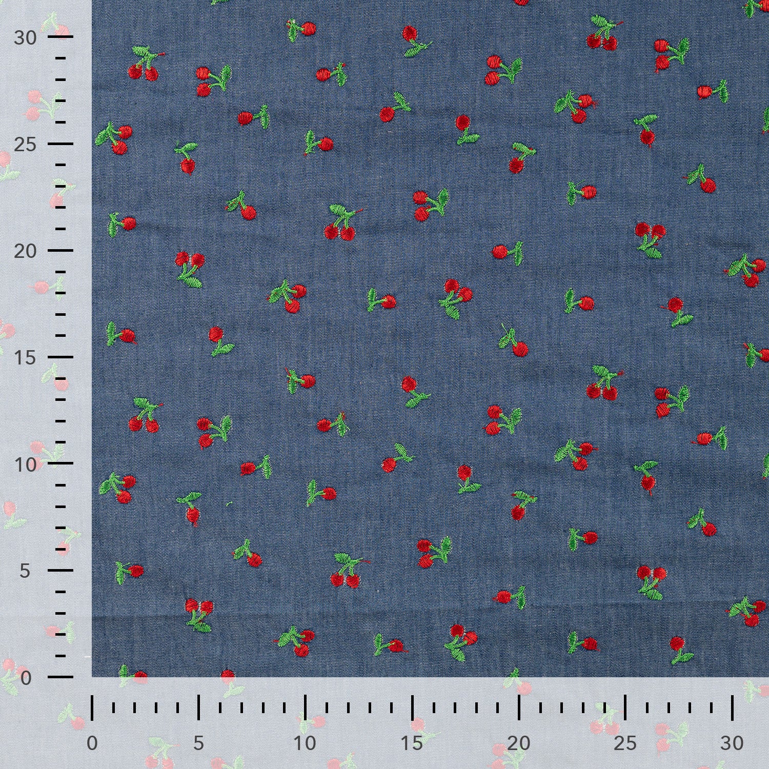 Tissu jean fin à broderie cerise