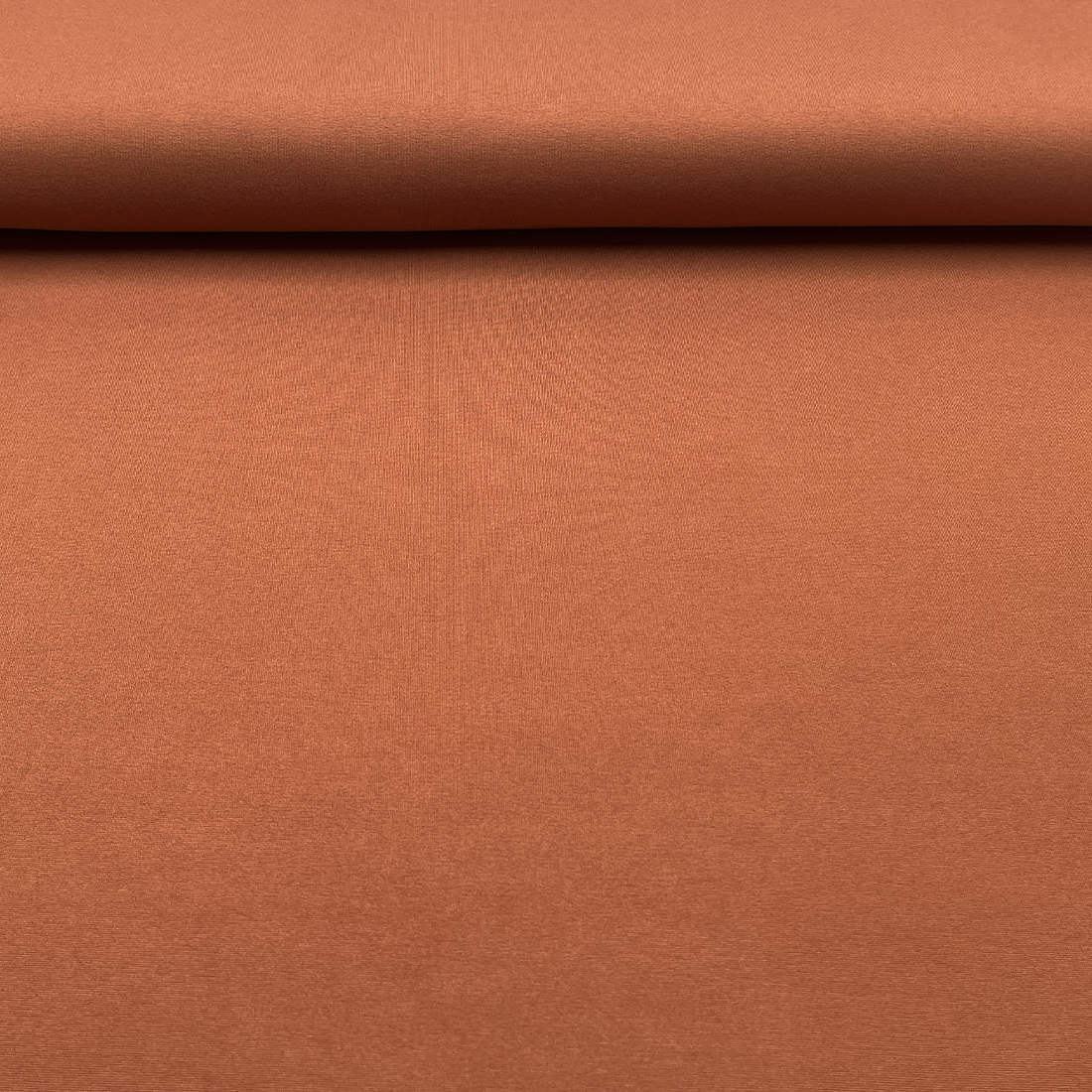 Tissu Jersey de Punto terracotta – Élégance et confort inégalés