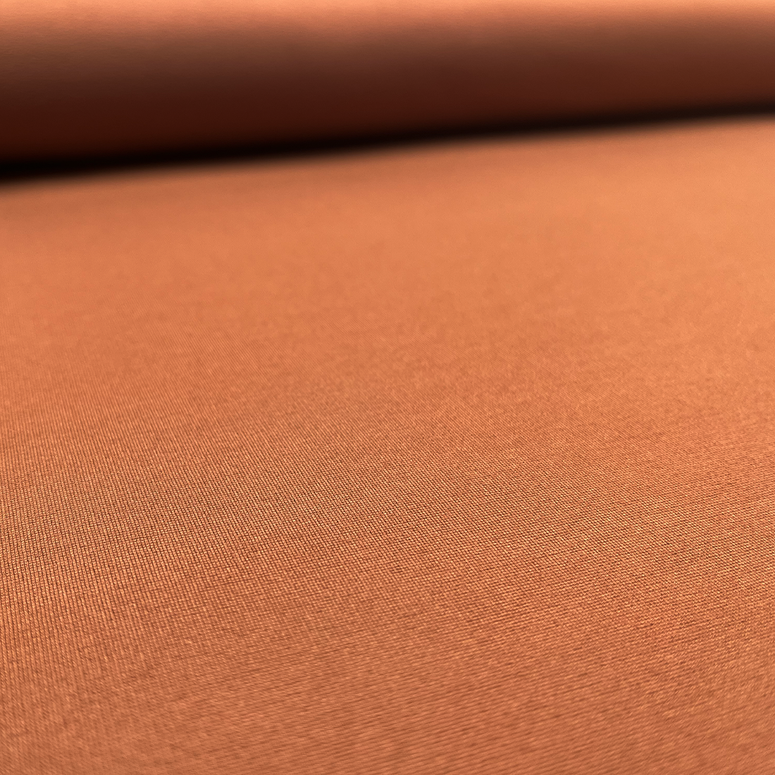 Tissu Punto terracotta – Tombé lourd et texture douce