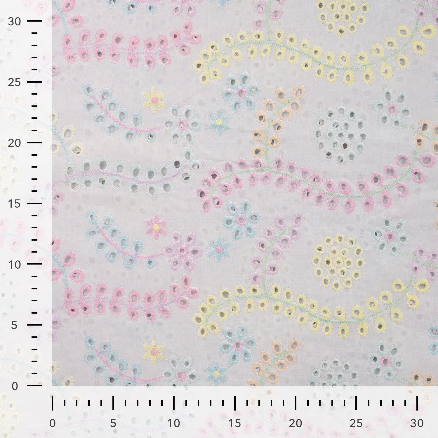 Tissu coton à broderie fleurs pastel