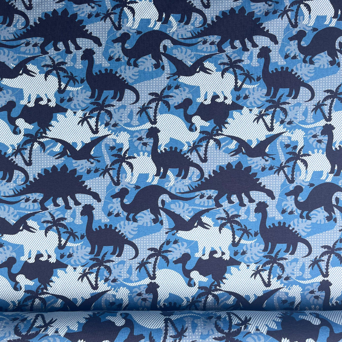 Tissu jersey amusant avec dinosaures
