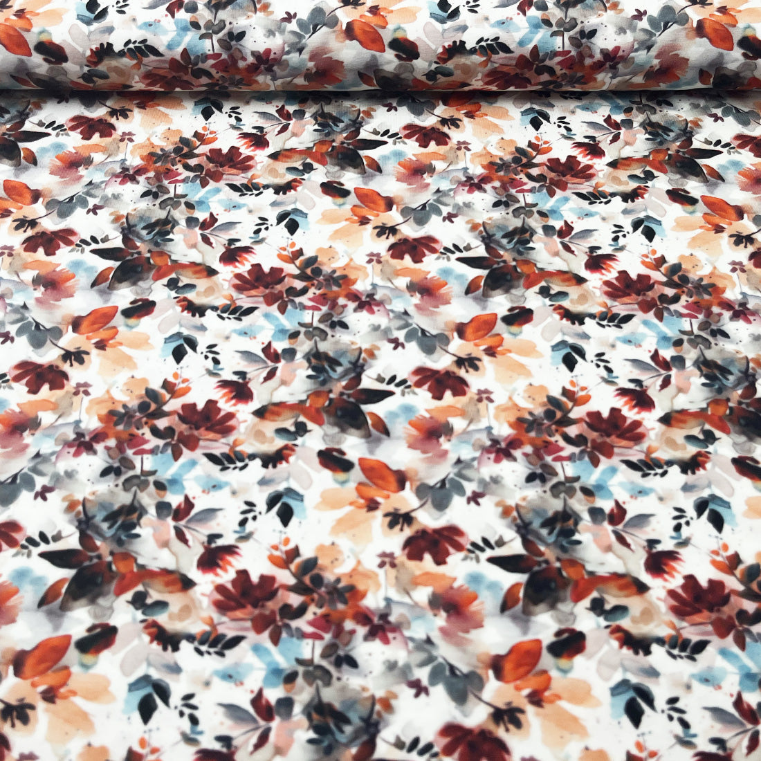 Tissu jersey automnal aux feuilles rouges, oranges et jaunes – Douceur et confort