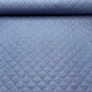 Tissu matelassé denim – Confort et look moderne