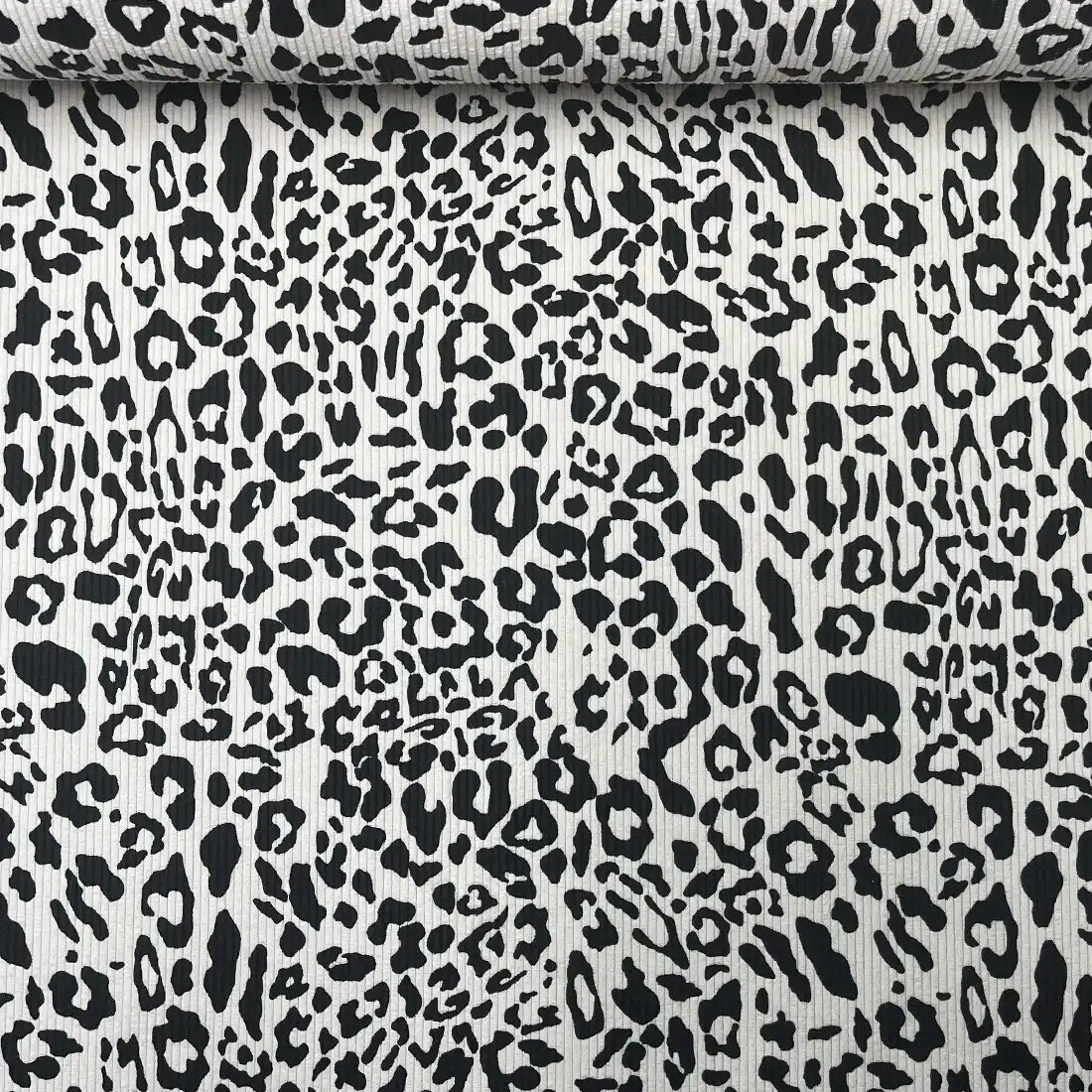 Velours léopard bicolore noir et blanc