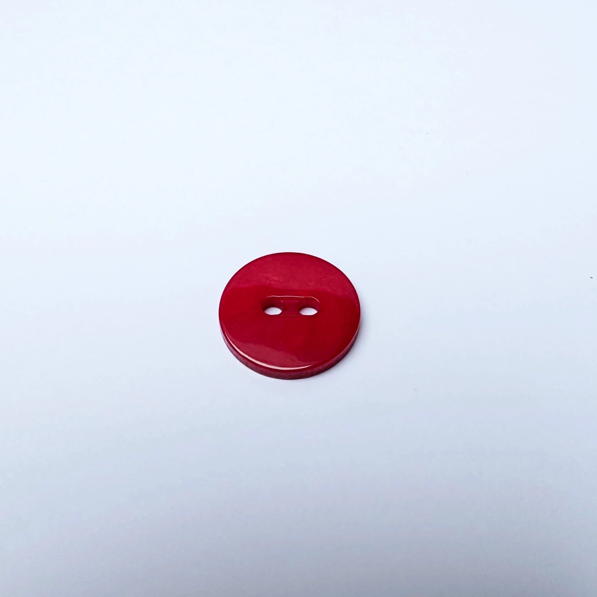 Bouton de couture rond rouge
