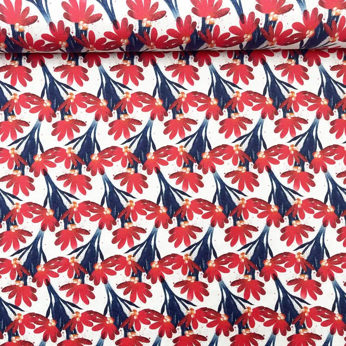 Jersey à fleurs rouges et feuillage bleu