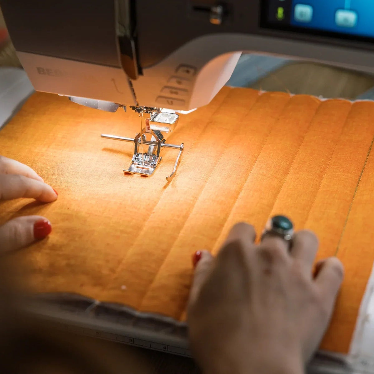 Machine à coudre et à broder BERNINA 770 QE PRO — en situation, atelier de quilting