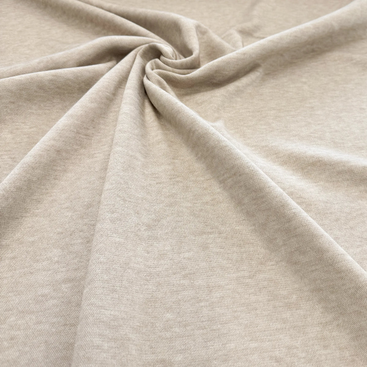 Maille tricot beige chiné drapée