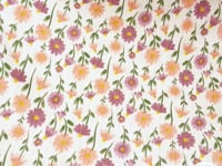Tissu Jersey Ajouré Pâquerettes pastel
