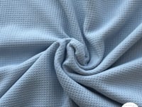 Tissu nid d’abeille doublé d’éponge bleu clair