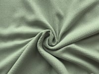 Tissu nid d’abeille doublé d’éponge vert menthe