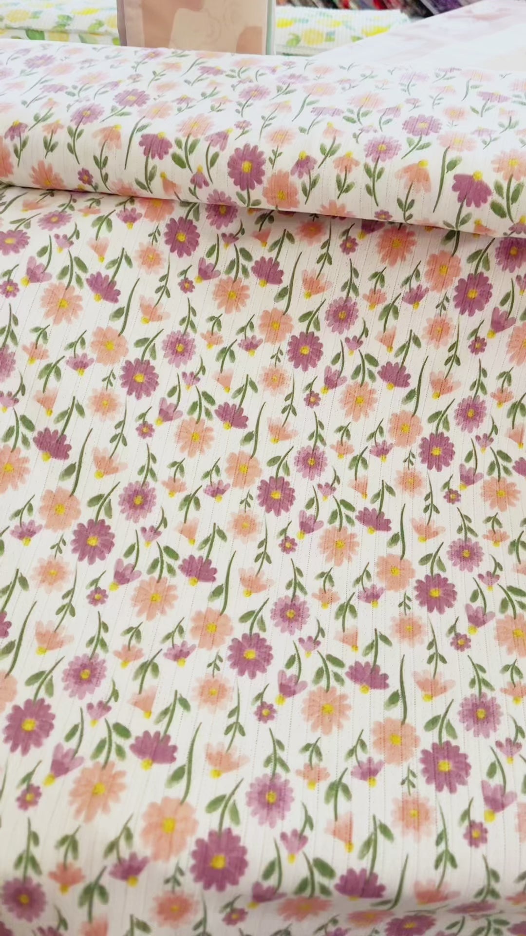 Tissu Jersey Ajouré Pâquerettes pastel
