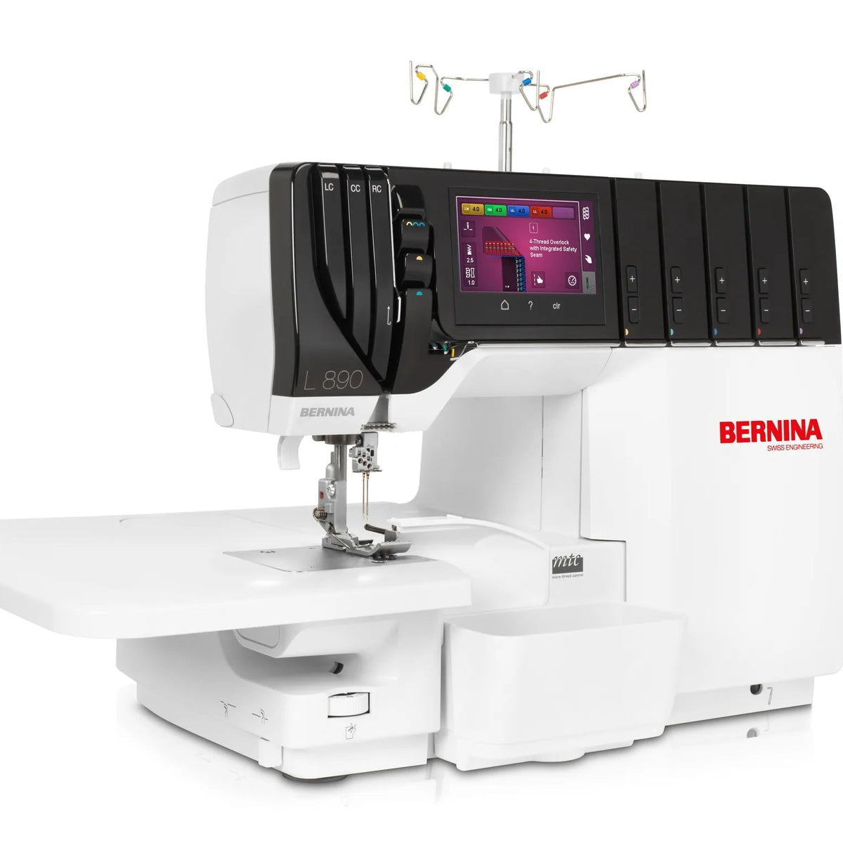 Surjeteuse-recouvreuse BERNINA L 890 — en atelier, avec table rallonge, surjet